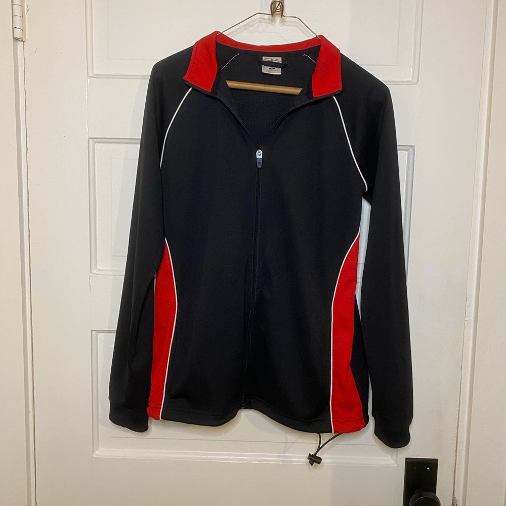 Women’s size Medium Boombah zip up jacket.